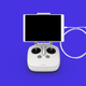 El controlador del DJI Phantom 4 con una tablet y su cable.
